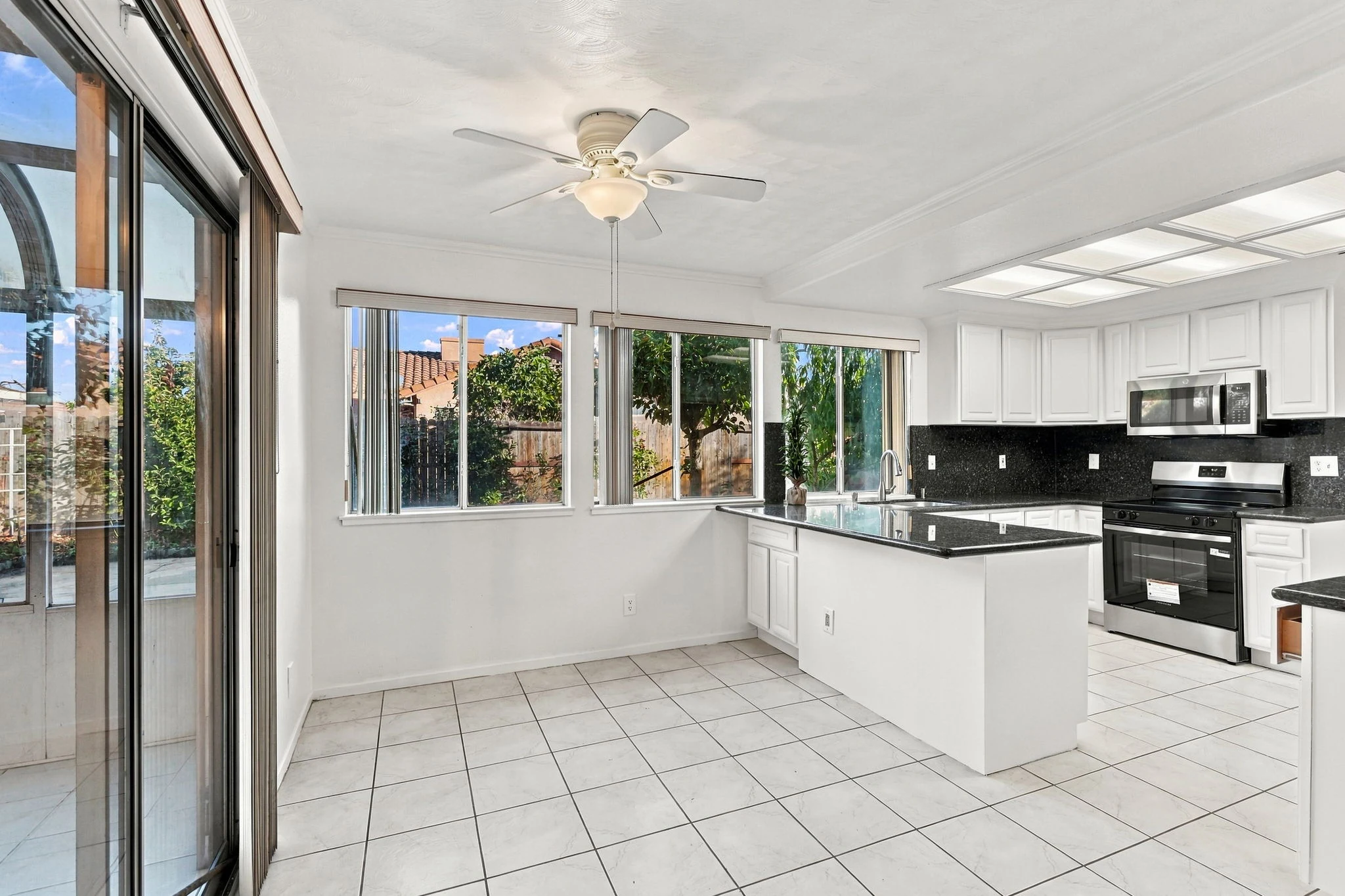 Kitchen and bright breakfast area